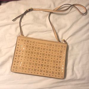 Michael Kors clutch or crossbody eyelet purse
